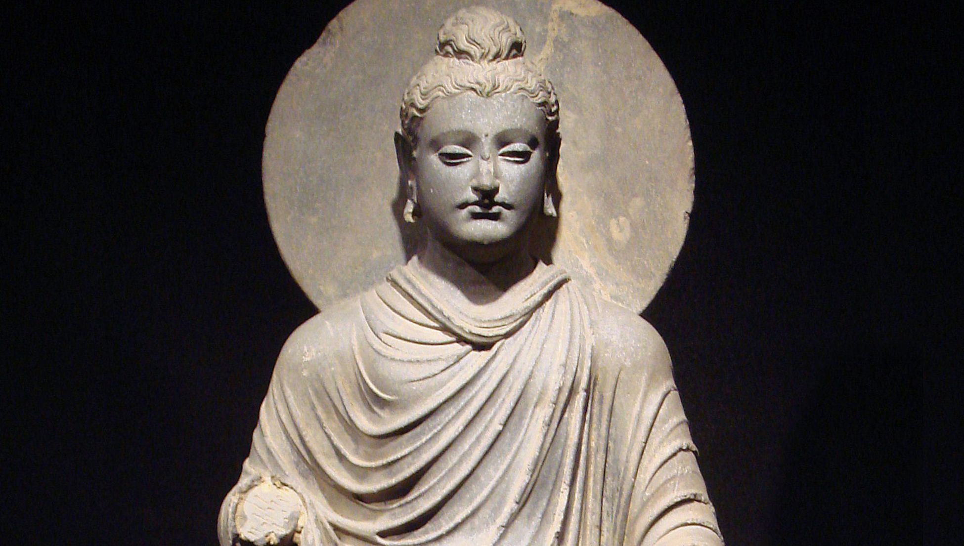 Why the first Buddhas in art wore finely folded Greek tunics | Psyche